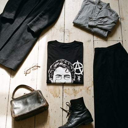 Emma Goldman black graphic tee styled in a flat lay with matching pieces