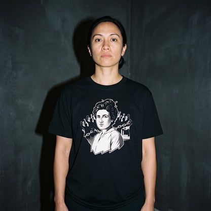 Woman wearing the Rosa Luxemburg black graphic tee
