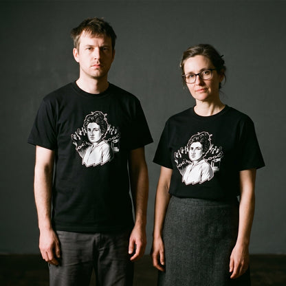 Two models wearing the Rosa Luxemburg black graphic tee