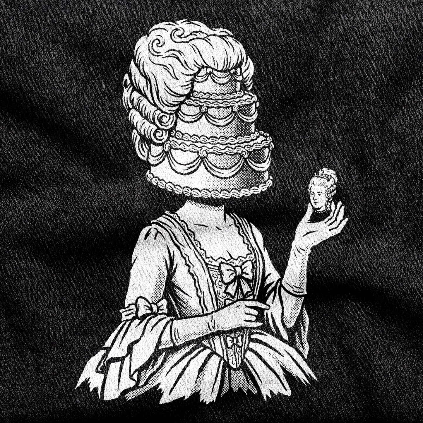 Marie Antoinette design printed on a black cotton tee, close-up