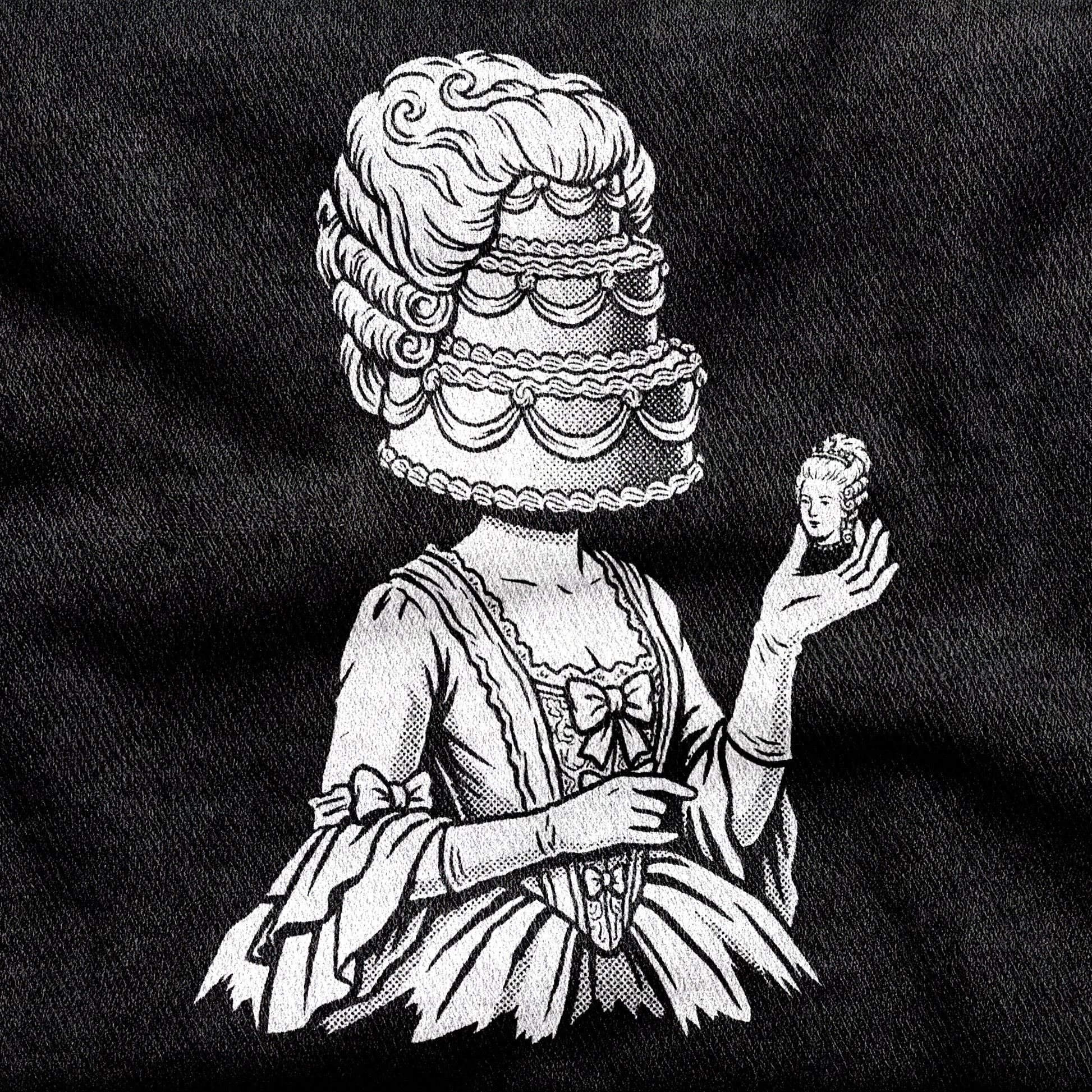 Marie Antoinette design printed on a black cotton tee, close-up