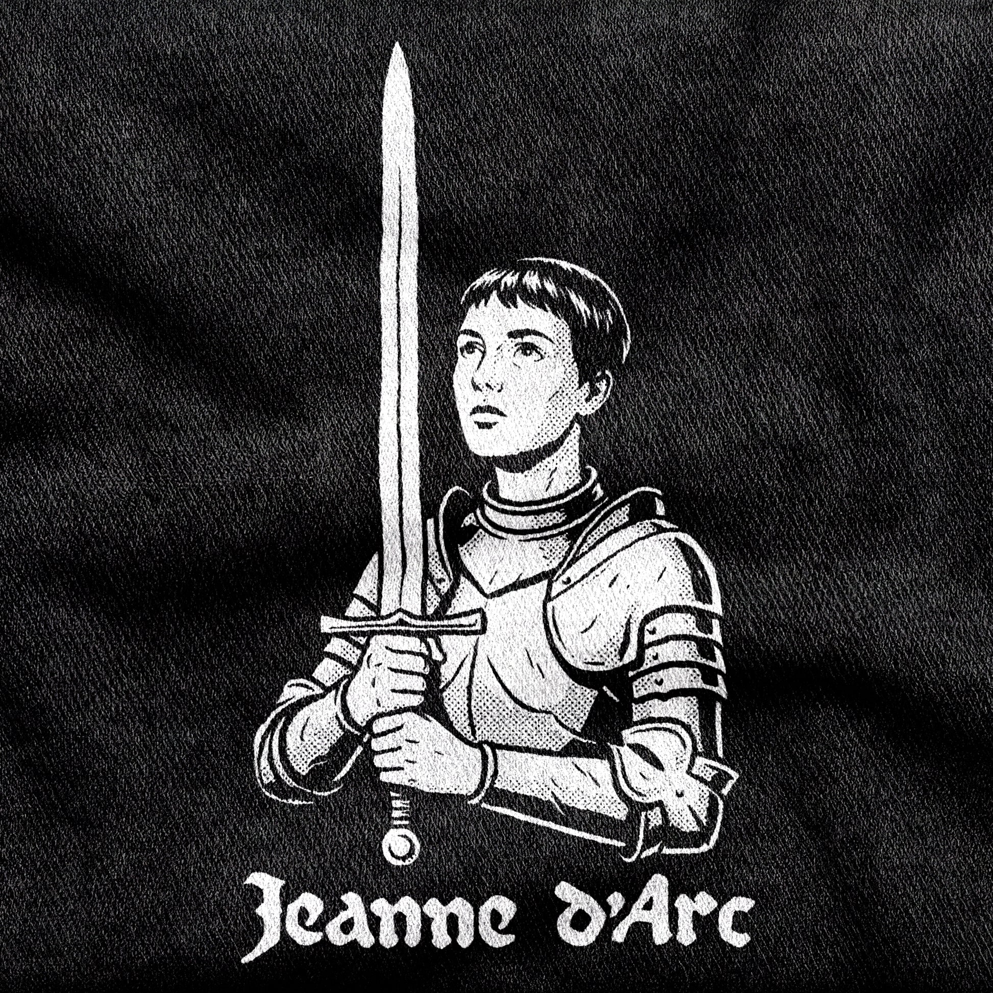 Jeanne d'Arc design printed on a black cotton tee, close-up