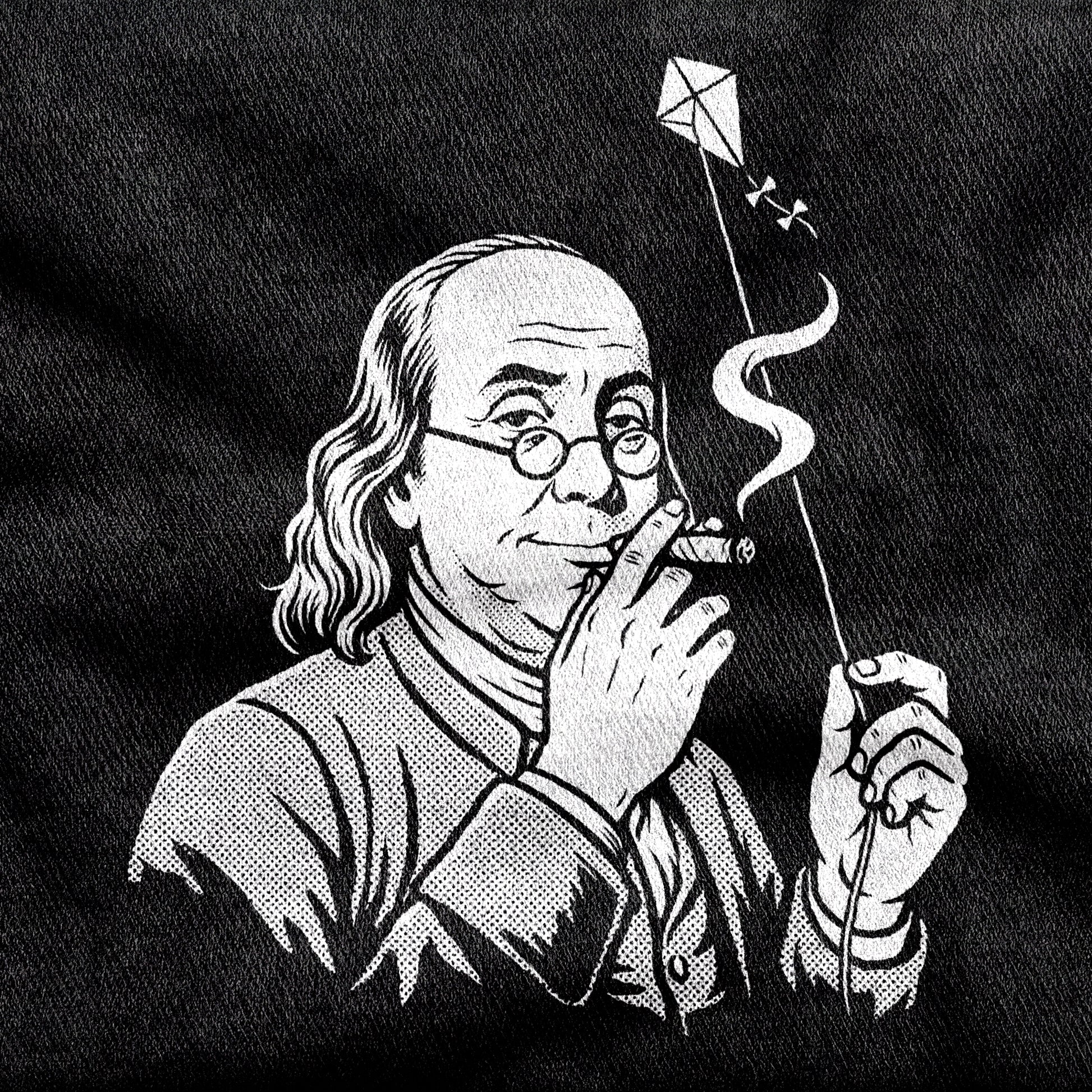 Benjamin Franklin High as a Kite design printed on a black cotton tee, close-up