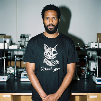 Man wearing the Schrödinger's Cat black graphic tee
