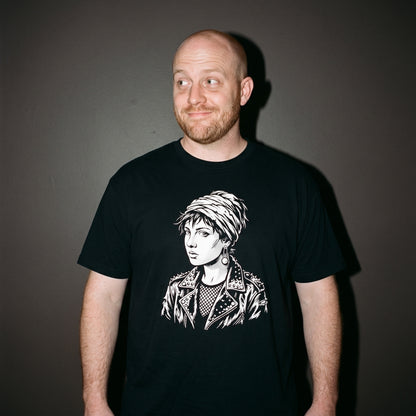 Man wearing the Girl with a Pearl Earring black graphic tee