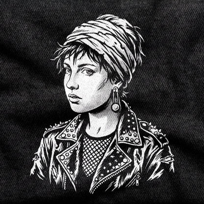 Girl with a Pearl Earring design printed on a black cotton tee, close-up
