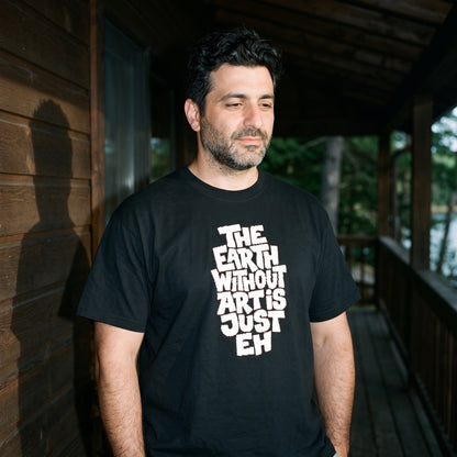 Man wearing the The Earth Without Art is Just Eh black graphic tee