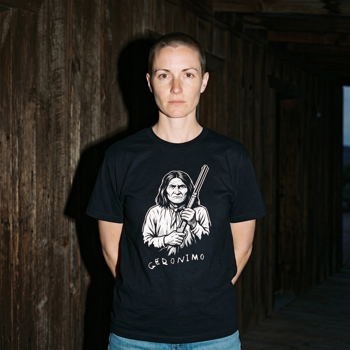 Woman wearing the Geronimo black graphic tee