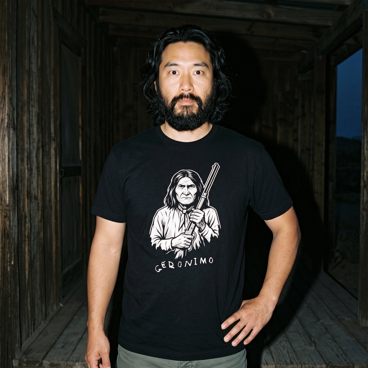 Man wearing the Geronimo black graphic tee