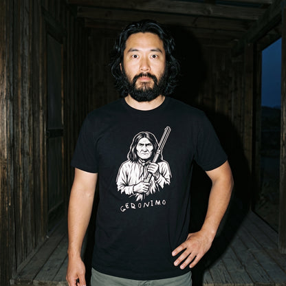 Man wearing the Geronimo black graphic tee