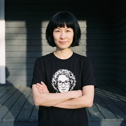 Woman wearing the Margaret Atwood black graphic tee