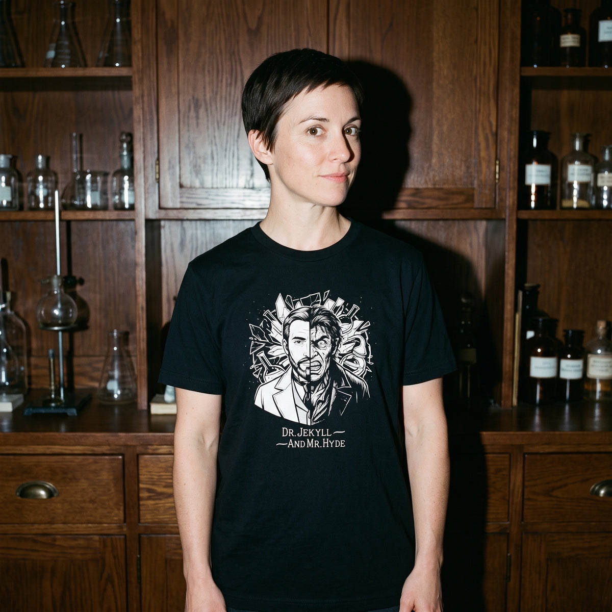 Woman wearing the Dr. Jekyll and Mr. Hyde black graphic tee