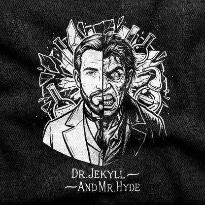 Dr. Jekyll and Mr. Hyde design printed on a black cotton tee, close-up