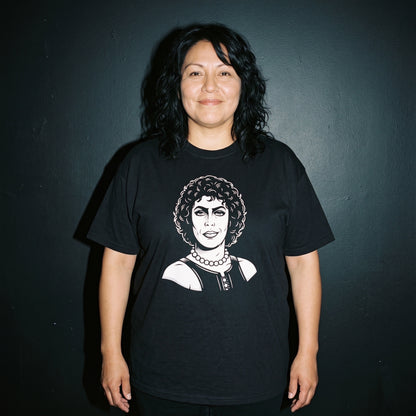 Woman wearing the Frank-N-Furter black graphic tee