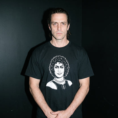 Man wearing the Frank-N-Furter black graphic tee