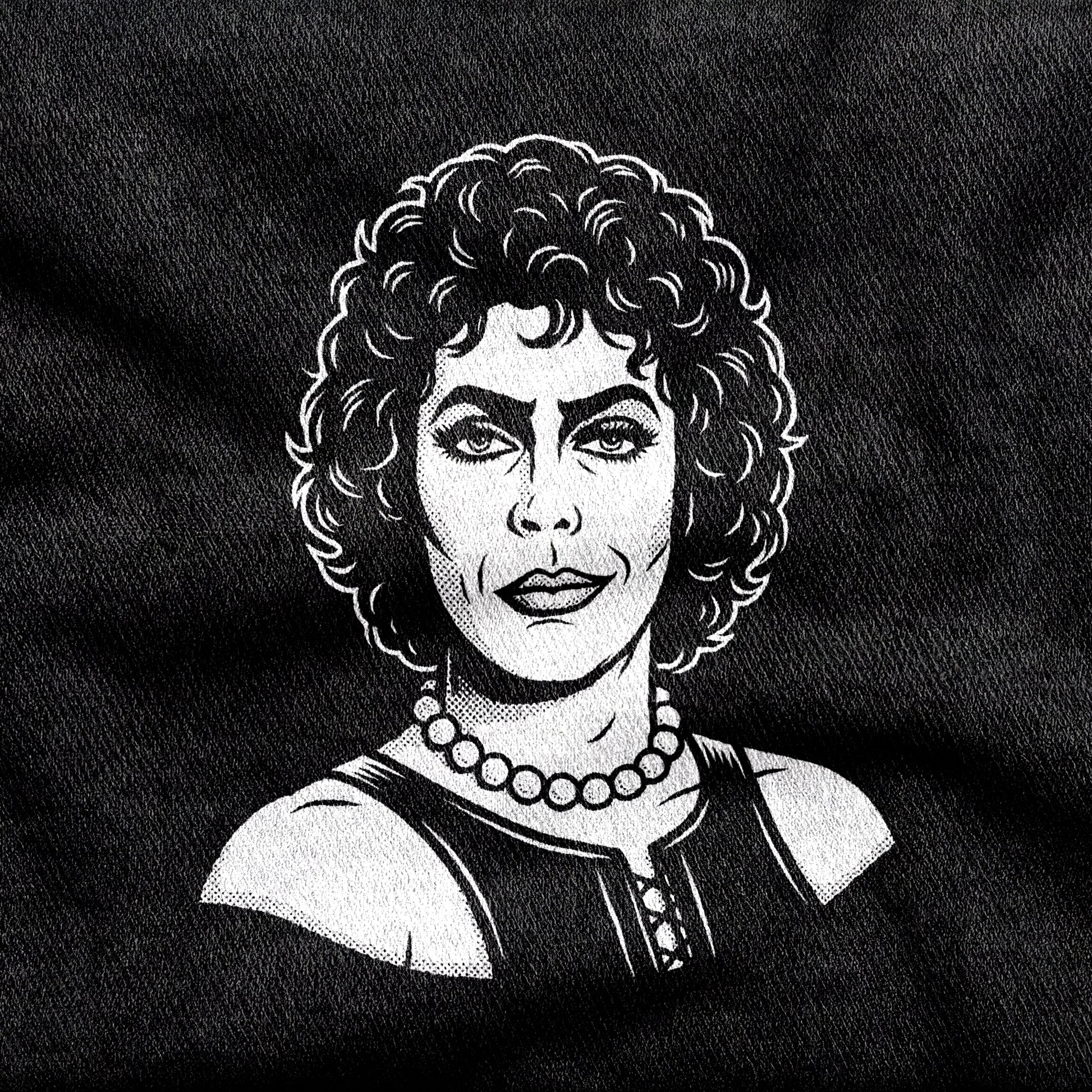 Frank-N-Furter design printed on a black cotton tee, close-up