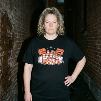 Woman wearing the Waldo in Montreal black graphic tee