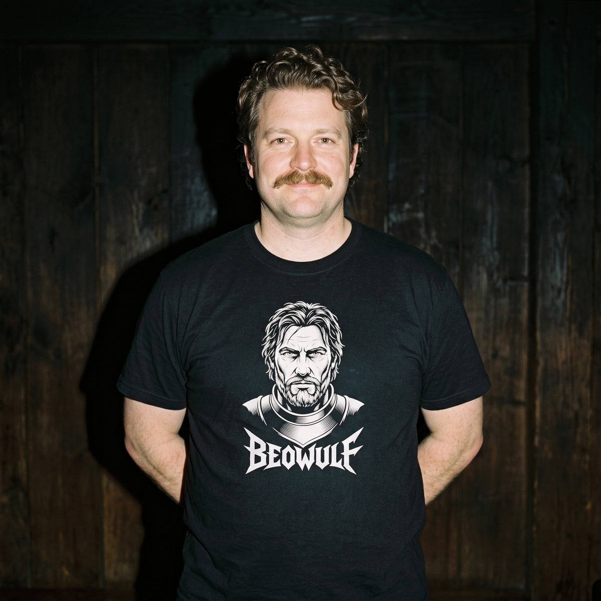 Man wearing the Beowulf black graphic tee