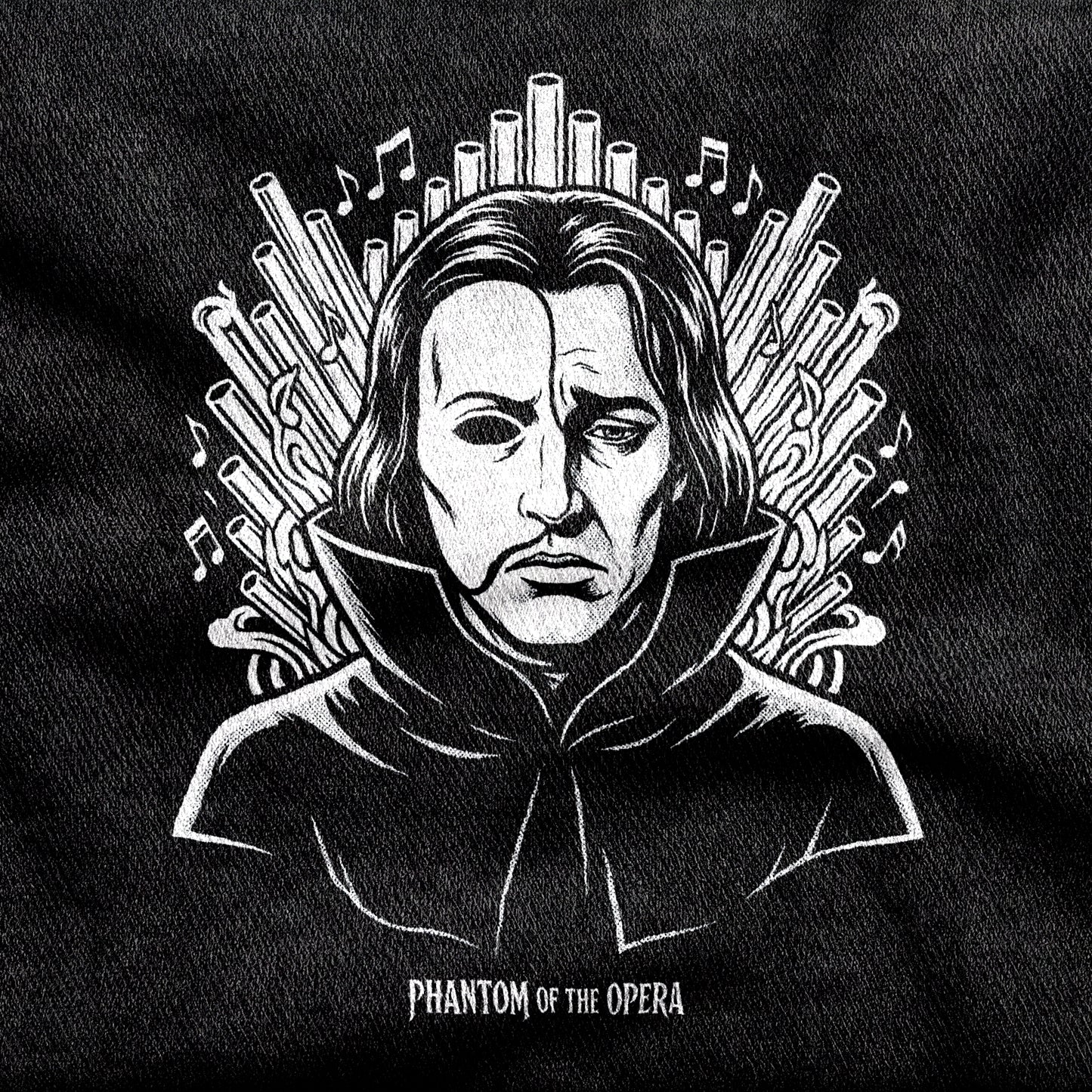 Phantom of the Opera design printed on a black cotton tee, close-up