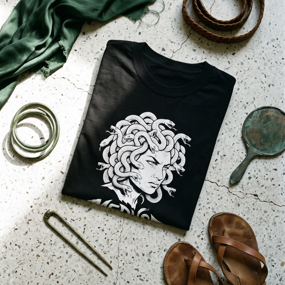 Medusa black graphic tee styled in a flat lay with matching pieces