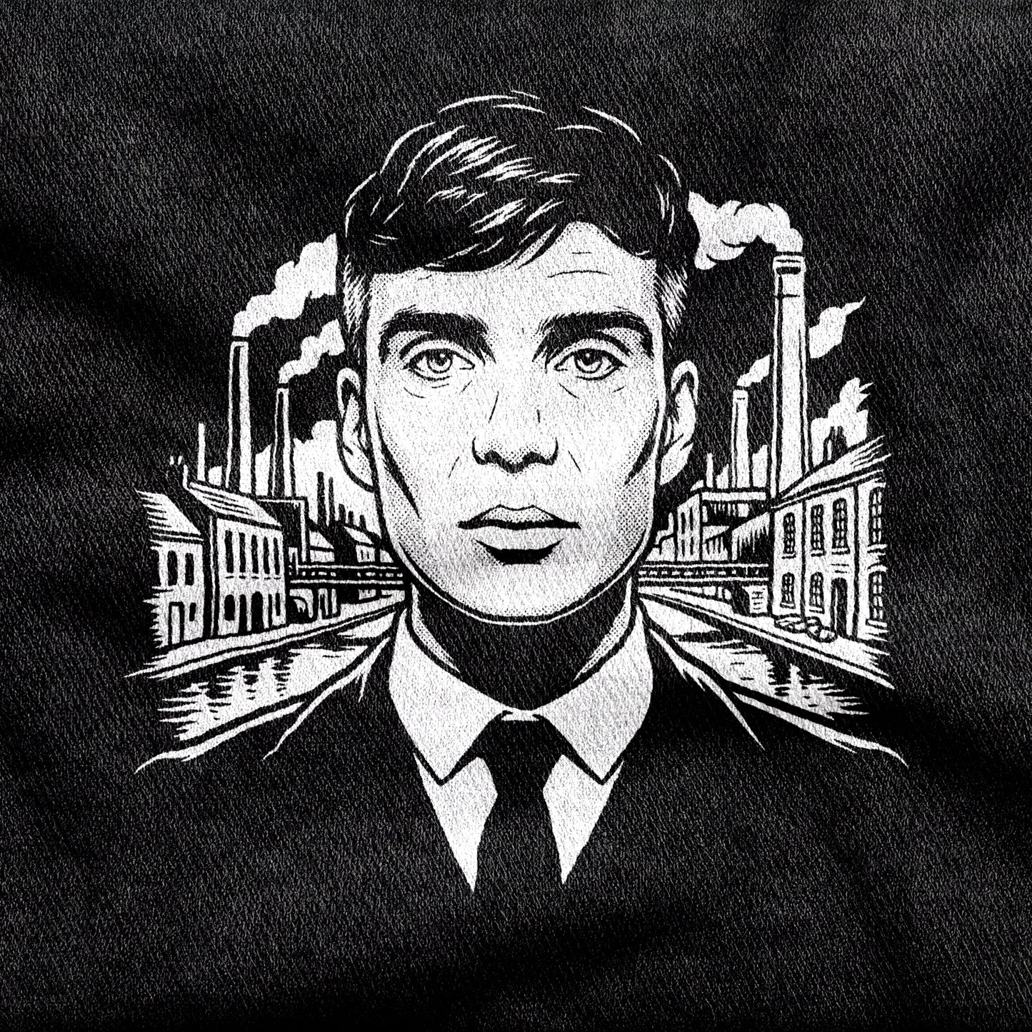 Tommy Shelby design printed on a black cotton tee, close-up