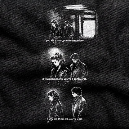 Masculin Féminin design printed on a black cotton tee, close-up