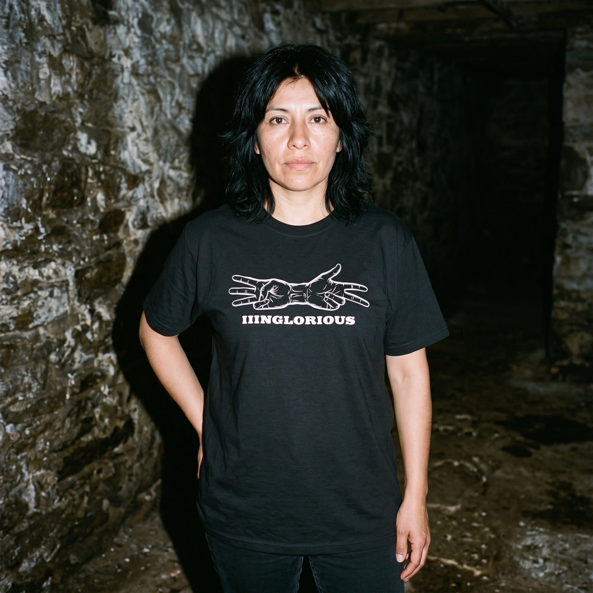 Woman wearing the Inglourious Basterds black graphic tee