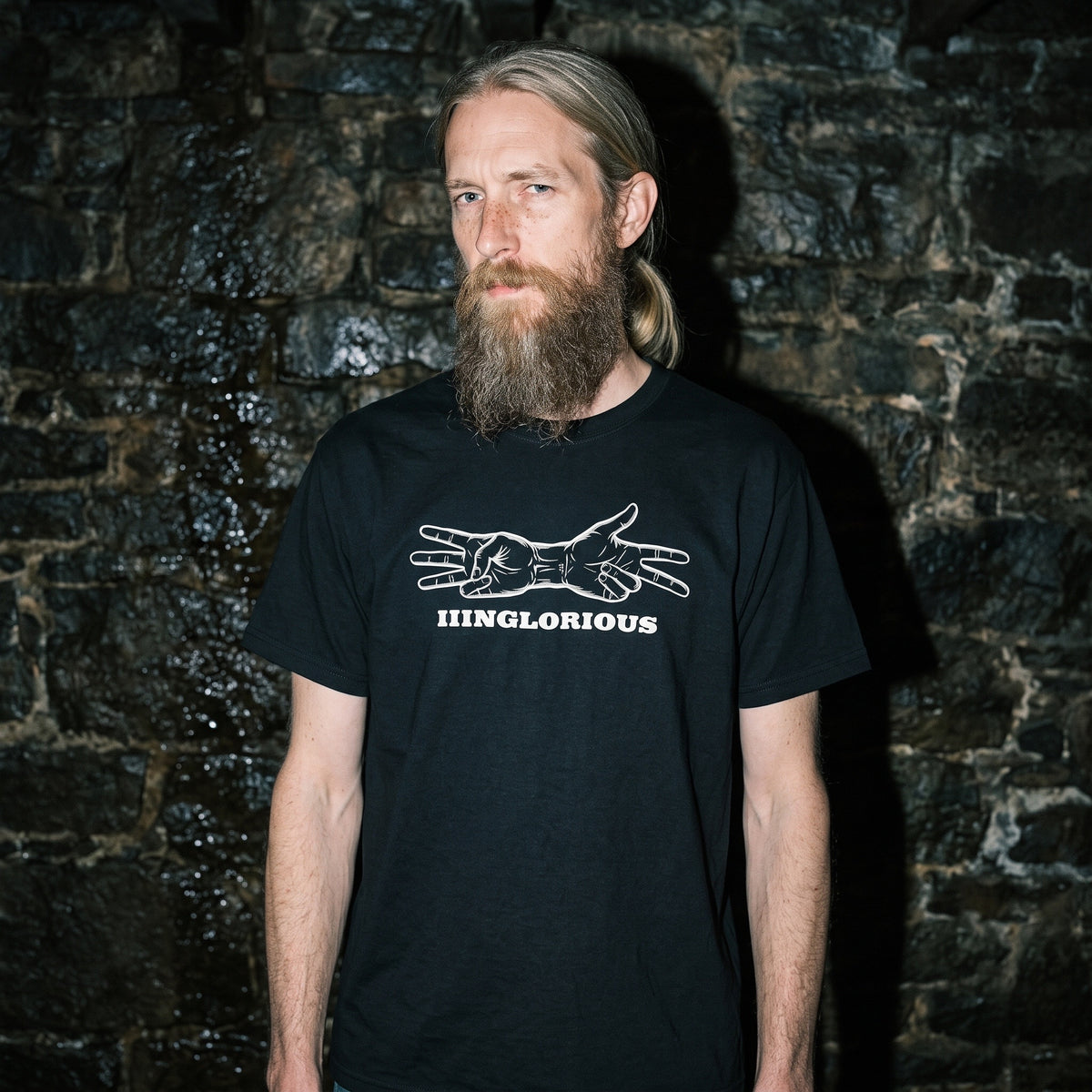 Man wearing the Inglourious Basterds black graphic tee