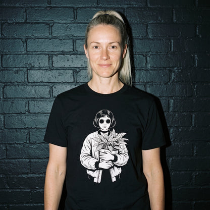 Woman wearing the Mathilda black graphic tee