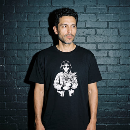 Man wearing the Mathilda black graphic tee