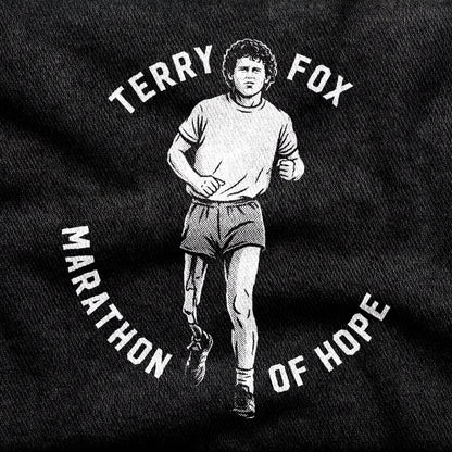 Terry Fox Marathon of Hope design printed on a black cotton tee, close-up
