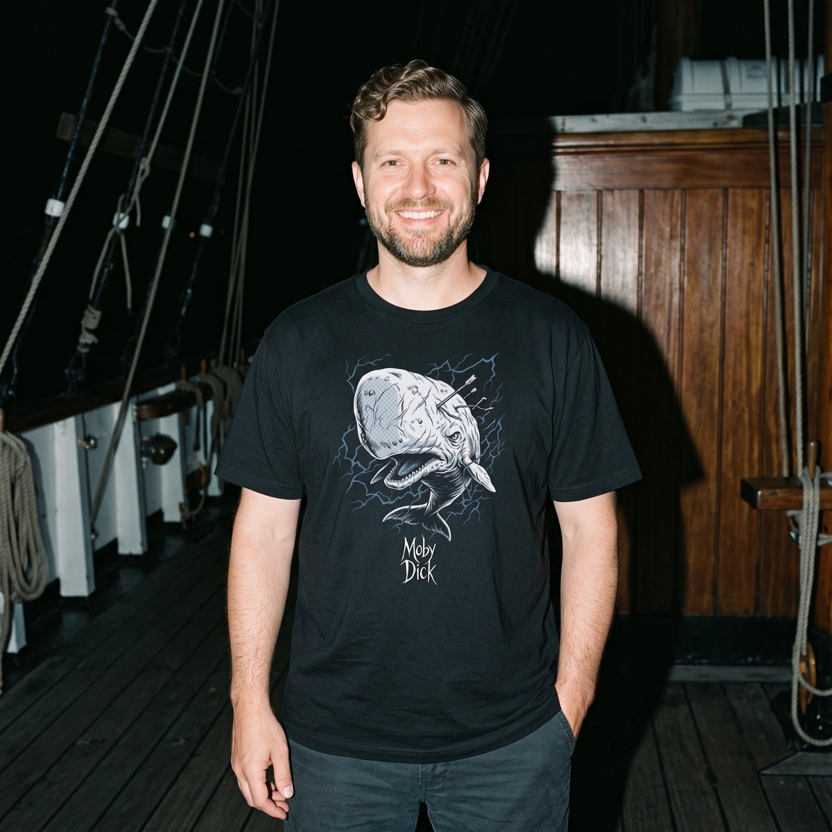 Man wearing the Moby Dick black graphic tee