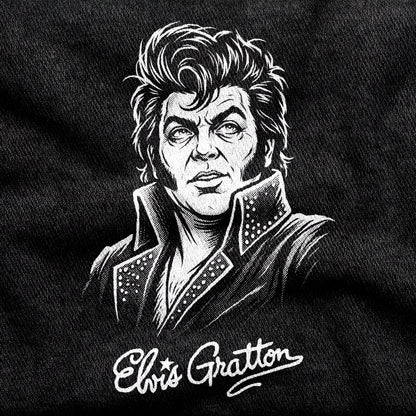 Elvis Gratton design printed on a black cotton tee, close-up