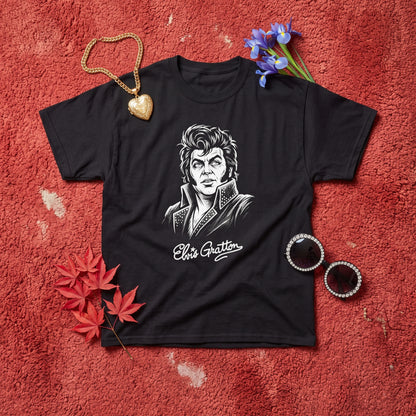 Elvis Gratton black graphic tee, styled flat lay