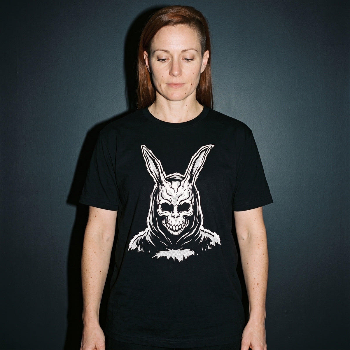 Woman wearing the Donnie Darko black graphic tee