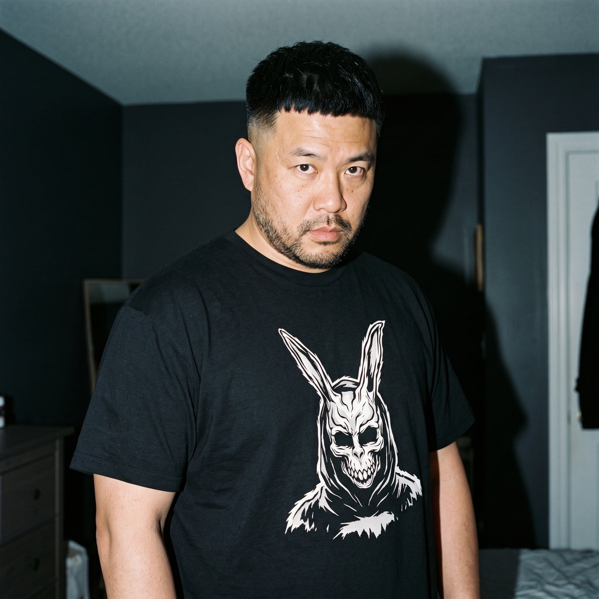 Man wearing the Donnie Darko black graphic tee