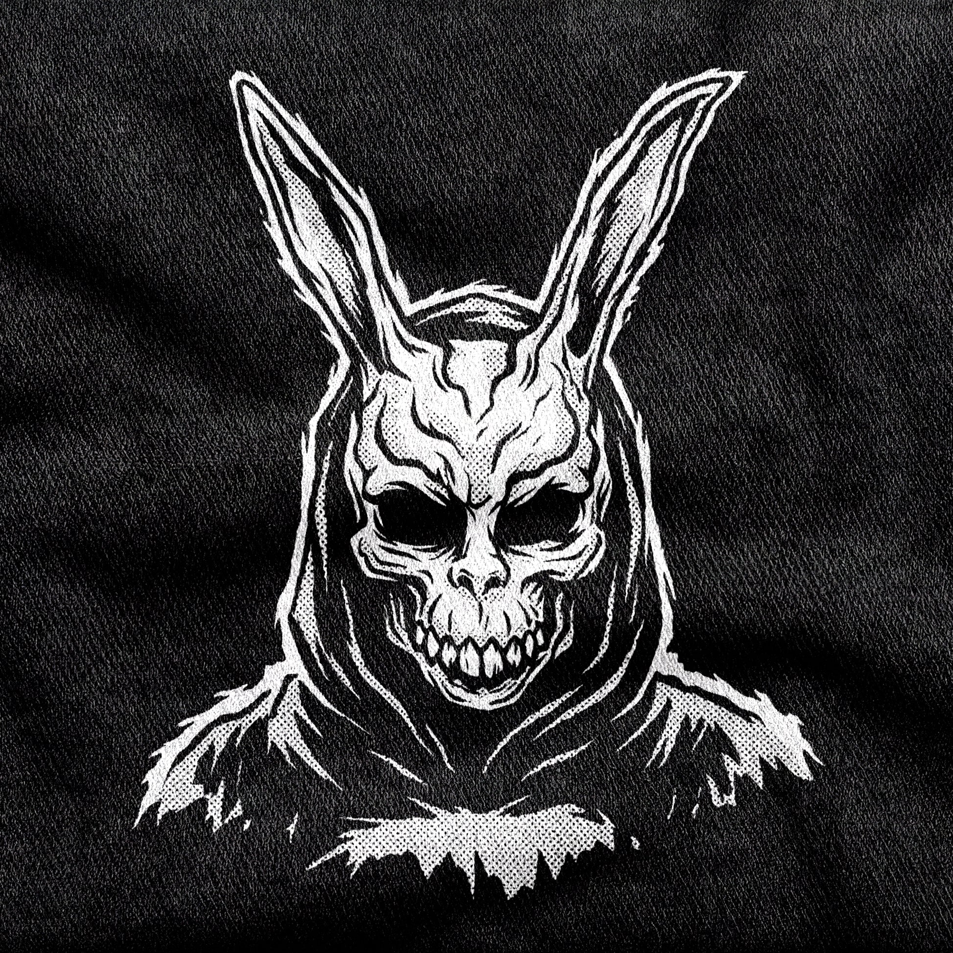 Donnie Darko design printed on a black cotton tee, close-up