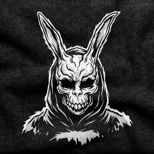 Donnie Darko design printed on a black cotton tee, close-up