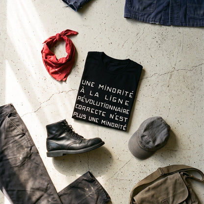 Une Minorité à la Ligne Révolutionnaire Correcte n'est plus une Minorité black graphic tee styled in a flat lay with matching pieces
