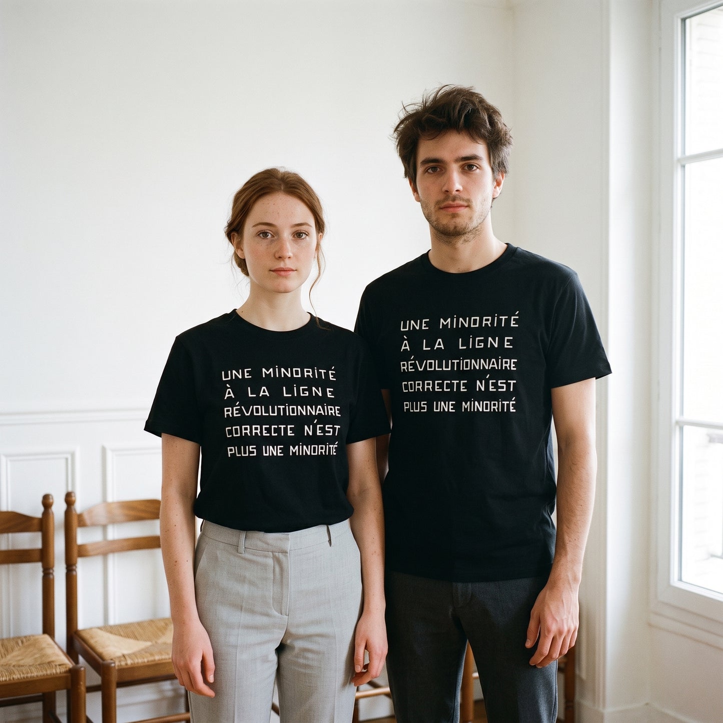 Two models wearing the Une Minorité à la Ligne Révolutionnaire Correcte n'est plus une Minorité black graphic tee