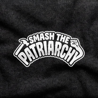 Smash the Patriarchy design printed on a black cotton tee, close-up