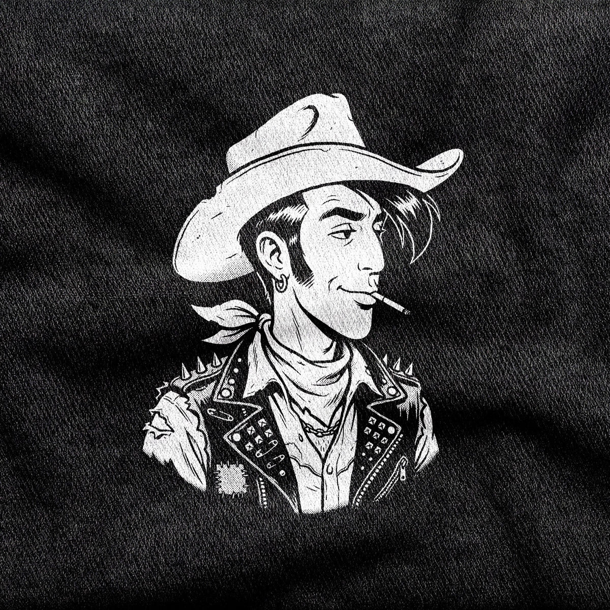Punky Luke design printed on a black cotton tee, close-up