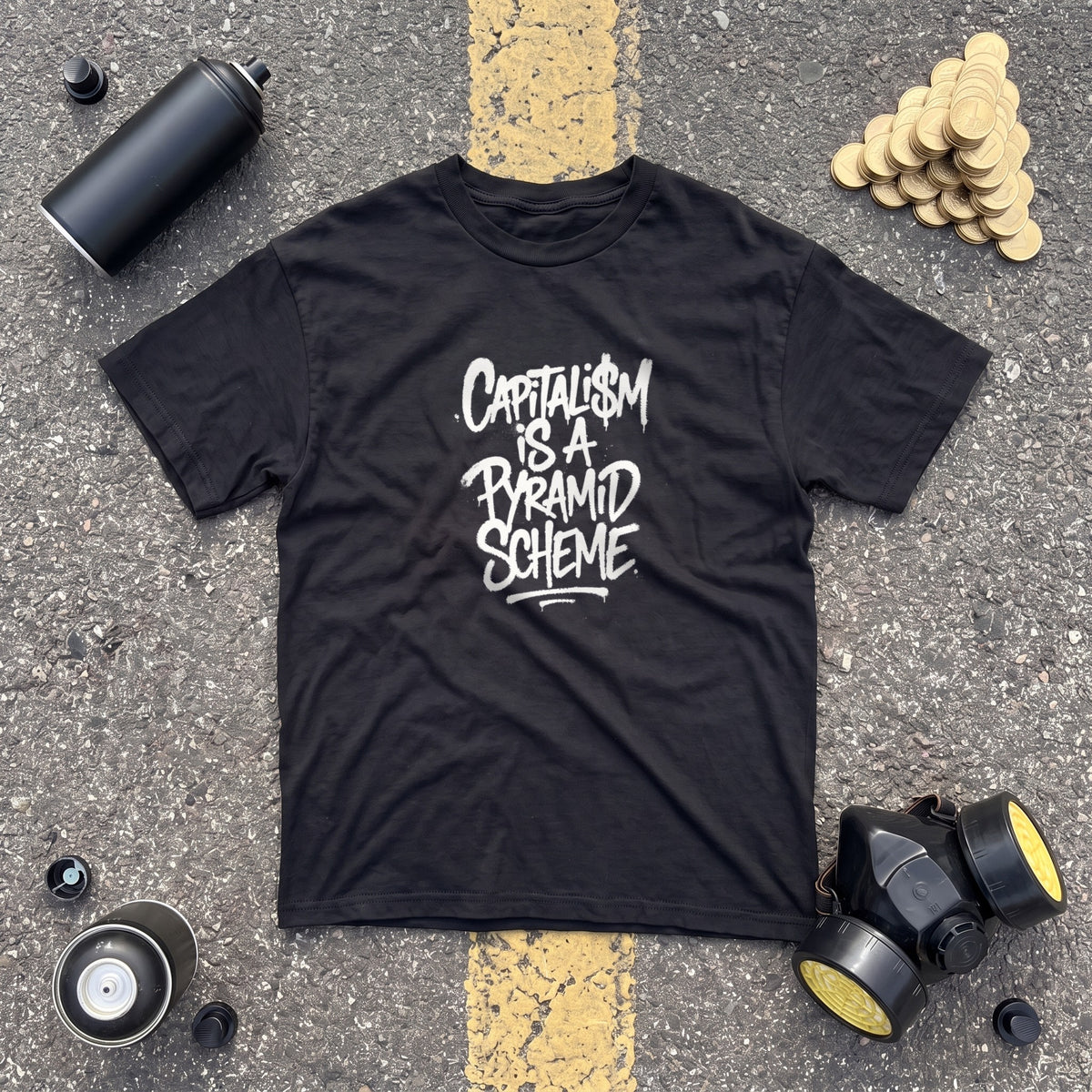 Capitalism is a Pyramid Scheme black graphic tee, styled flat lay