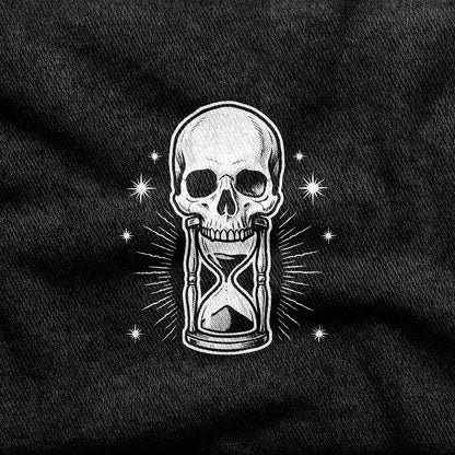 Memento Mori design printed on a black cotton tee, close-up