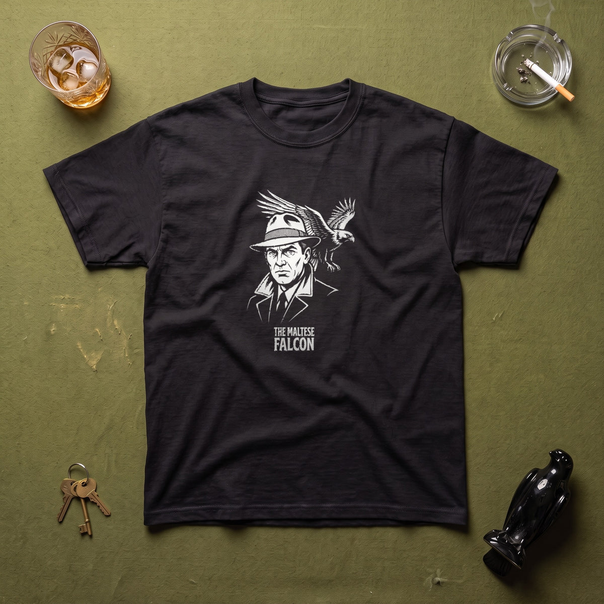 The Maltese Falcon black graphic tee, styled flat lay