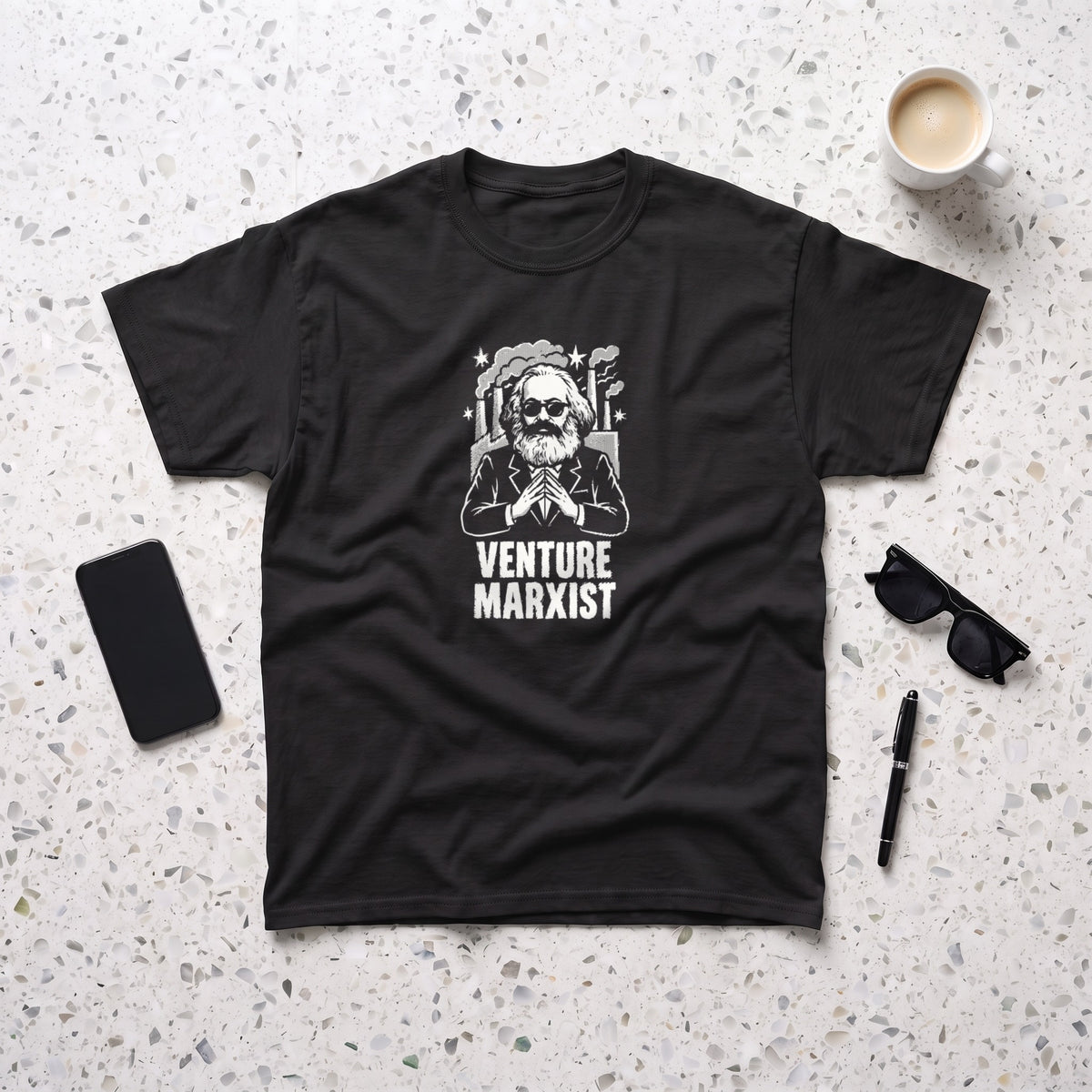 Venture Marxist black graphic tee, styled flat lay