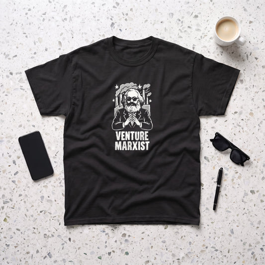 Venture Marxist black graphic tee, styled flat lay