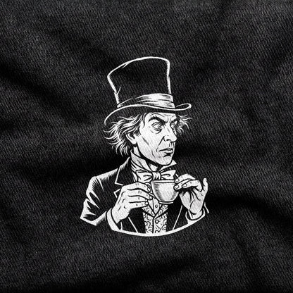 The Mad Hatter design printed on a black cotton tee, close-up