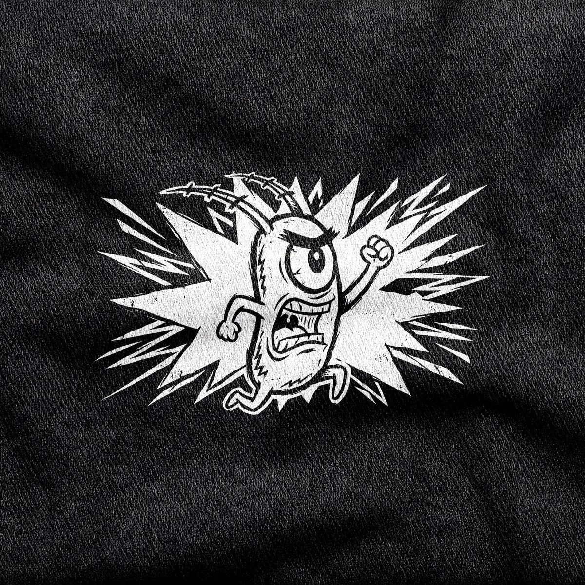 Plankton design printed on a black cotton tee, close-up